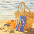 summer vacation beach bag on the sand